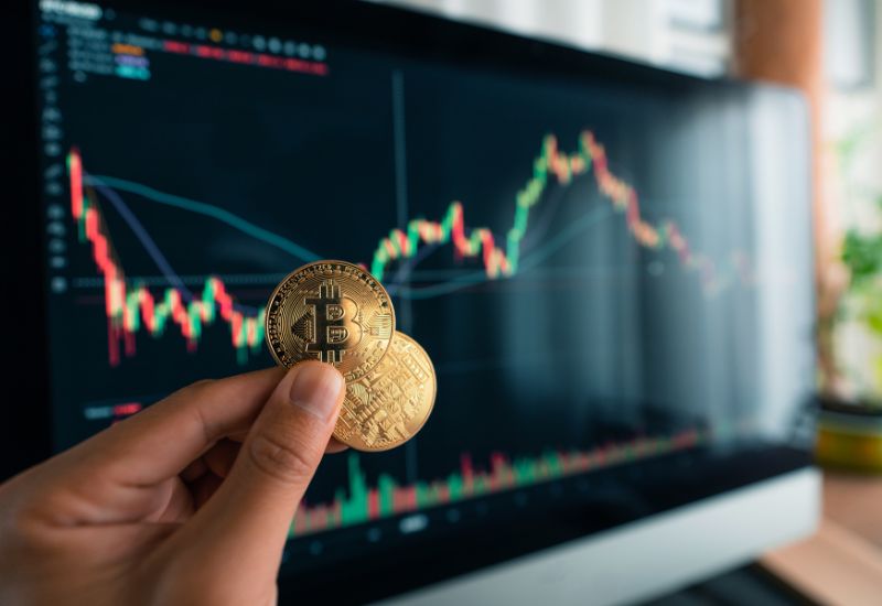 Hand holding Bitcoins