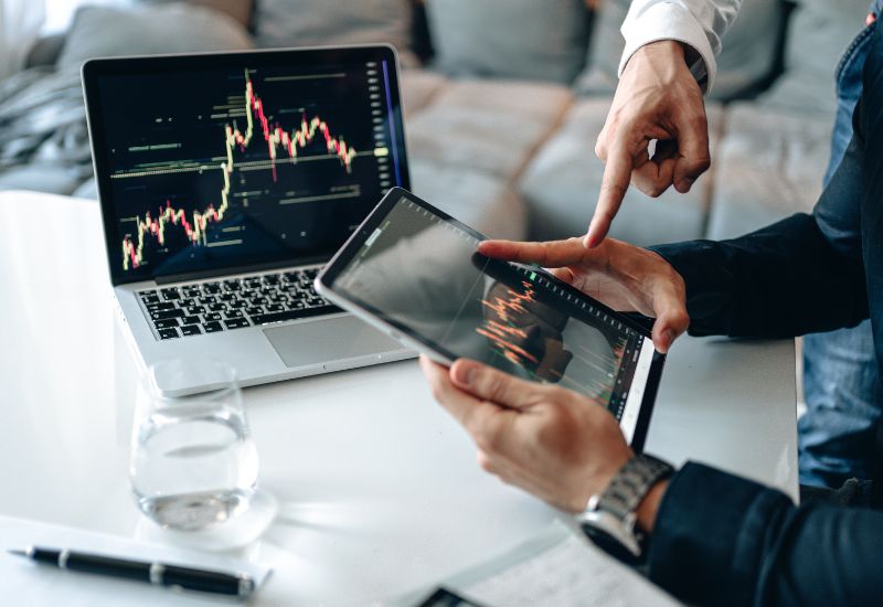 Crypto Investors Analyzing Graphic