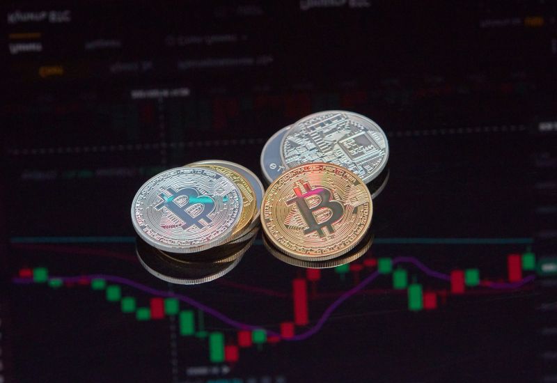 Bitcoins above Crypto Graphic