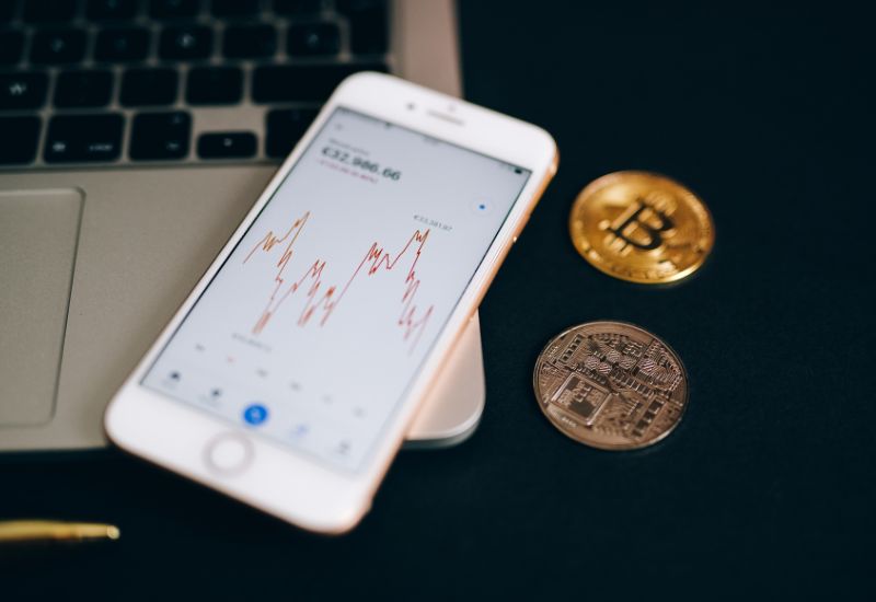 Crypto Coins and Phone with Crypto Graphic