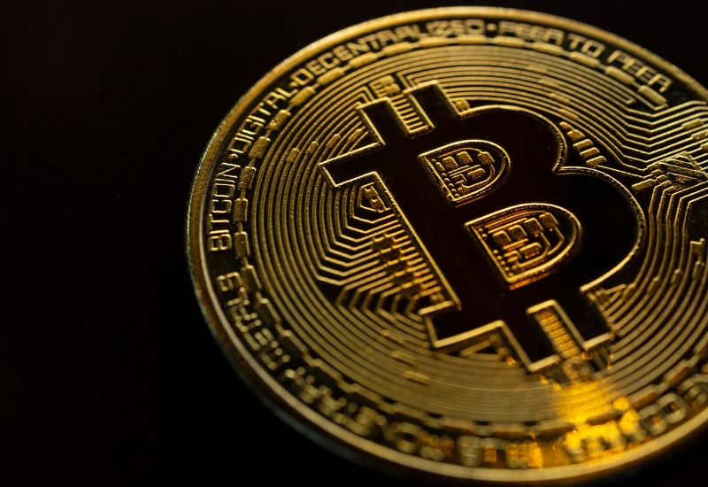 Bitcoin above Black Background