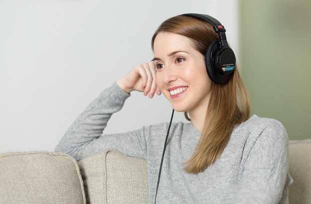 A woman listening to music