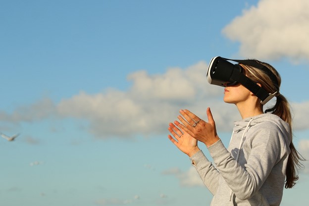 A woman wearing a VR headset