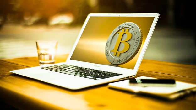 Image of laptop displaying Bitcoin