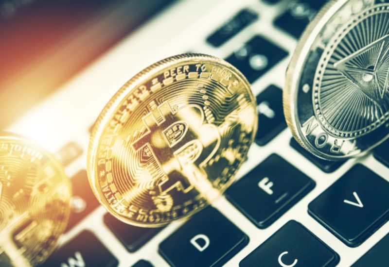 Bitcoin Holograms Above a Computer