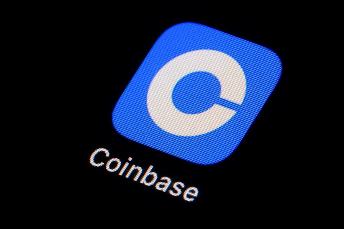 Coinbase stock rises after company posts higher revenue on crypto market upswing